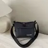 Bolso bandolera deportivo sencillo para hombres y mujeres, mochila pequeña nueva de cuadros, bolso de hombro casual para el trabajo para parejas, bolso de moda para hombre