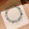 Pulsera de Lujo Ligero Estilo Francés con Cierre de Flor Ovalada de Circonita, Diseño Único, Joyería Exquisita y Versátil