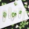 Atacado unhas postiças vermelhas da internet arte de unhas verde fruta strass diamante fundo pontiagudo formato amor borboleta tridimensional multi-corte acessórios para unhas