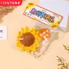 Llavero de ganchillo para el Día del Maestro con girasol y ramo de duraznos, un regalo para los maestros en el Día del Maestro