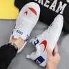 Sapatos Masculinos 2025 Novo Verão Tendência Marca Malha Casual Esportivo Corrida Solado Macio Jovem Sapatos Brancos Fabricante
