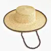 Nuevo sombrero de paja de moda europea y americana transfronteriza para el verano, protección solar, elegante sombrero de paja de trigo con perlas y ala ancha para mujer