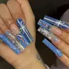 Uñas Portátiles de Navidad Copo de Nieve Amor Brillo Manicura Uñas Postizas Cortas Almendra Mariposa Uñas Largas Europeas y Americanas Venta al por Mayor