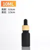 Botella dispensadora de aceites esenciales esmerilada con veta de madera Cosméticos 5 ml Gotero de vidrio Botella mezcladora Muestra Cosméticos