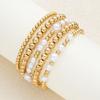 Joyería de mano de venta caliente transfronteriza Pulsera elástica sencilla de moda con cuentas para mujer europea y americana Impermeable Resistente al desgaste Paquete de 7