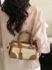 Bolso pequeño de color block de moda transfronterizo para mujer, nuevo bolso de mano de nicho de alta gama, bolso de hombro y bandolera tejido para el trabajo, moderno