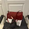Bolso de charol brillante de moda para debajo del brazo, nuevo estilo otoño 2026, chic, simple, texturizado, bolso baguette de mano para hombro