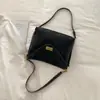 Primavera 2026 Nuevo Estilo Coreano Estilo Perezoso Hebilla de Cierre Bolso de Hombro Único para Debajo del Brazo Bolso de Viaje de Cuero Suave Retro Bolso Cruzado para Mujer