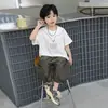 Traje de Verano de Manga Corta para Niños 2026 Nuevo Estilo Ropa Delgada de Verano para Niños Pantalones Cortos de Linterna para Bebé Conjunto de Dos Piezas