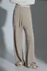 Chaleco de punto suelto adelgazante con cuello alto apilado estilo francés y pantalones rectos de pierna ancha para otoño-invierno, modelo nuevo de nicho 2026