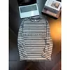 Camiseta de manga larga a rayas, estilo coreano holgado, perezosa, adelgazante, versátil, para hombre, primavera, otoño, moda, temperamento, cuello redondo, jersey, camiseta básica