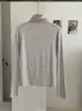 KEKEZOON Camiseta de manga larga ajustada de color liso con cuello semialto y volantes, hombro normal, prenda básica para mujer 8705