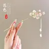 Novo grampo de cabelo de madeira retrô estilo chinês, nicho e simples, acessório de cabelo versátil com borlas da moda e design elegante