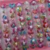 10 Caja en forma de corazón Regalo de cumpleaños 1 de junio Forma de corazón Niñas Bebé Juguete Anillo Dibujo animado Anillo abierto Venta al por mayor