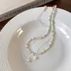 Collar de estrella de mar y perlas de temperamento de lujo ligero estilo coreano para mujer, moda, diseño simple de nicho, cadena para la clavícula de doble capa versátil