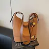 Bolso Cubo Frosted de Gran Capacidad Nuevo 2025 Transfronterizo, Bolso de Hombro Estilo Perezoso para Viajero, Bolso Cruzado de Moda Tendencia