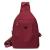 Atacado transfronteiriço de mochilas pequenas femininas de ombro único e duplo para atividades ao ar livre, casuais e leves, bolsas da moda para o dia a dia