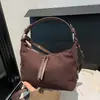Bolsa de Ombro Retro de Cor Sólida de Alto Valor 2026 Novo Estilo Início do Outono Individual Elegante para o Dia a Dia Bolsa de Ombro Único Transversal