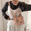 Bolso de mano retro con textura popular de este año, bolso de hombro colgante para mujer, tendencia de primavera 2025, sencillo y combinable.