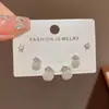 Bolsa da sorte de pérolas com design versátil e moderno estilo francês, conjunto de brincos de três peças, brincos elegantes e simples para o dia a dia para revenda