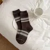 Nuevos calcetines apilados de longitud media de tendencia étnica de doble estilo vintage para otoño e invierno al por mayor, calcetines originales únicos para mujer