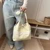 Nova Bolsa Feminina 2026 Estilo Japonês e Coreano Bolsa de Ombro com Laço e Renda Grande Capacidade Alto Valor Bolsa de Lona Estilo Fada Estudante