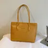 Bolsa Casual Transfronteiriça para Trajeto Diário Feminina Grande Capacidade 2026 Nova Outono Inverno Versátil Retrô Bolsa de Ombro Moda Bolsa Tote