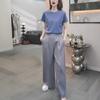 La ropa de verano popular de este año es hermosa con un conjunto de pantalones de pierna ancha nicho maduros ligeros sin colisión de dos piezas para mujer.