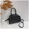 Bolso tejido 2026, mini bolso de concha patchwork estilo coreano, se puede llevar cruzado, versátil para el trabajo, bolso de hombro de nicho