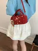 Bolso tipo baguette simple de mano estilo coreano para mujer 2026 Primavera Nuevo Versátil Casual Textura de Alta Calidad Bolso de Hombro Cruzado