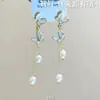 Pendientes nuevos de lujo con borlas de mariposa y diseño de hadas súper caídas, largos, elegantes y fríos, ligeros y de alta gama.