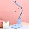 Nueva lámpara de mesa pequeña de dibujos animados LED mini portalápices manguera de almacenamiento luz de noche dormitorio dormitorio mesita de noche lámpara de mesa portátil