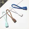 Atacado de fábrica de puxadores coloridos antiderrapantes moldados por injeção para vestuário de exterior, puxadores de mochila e cabeças de zíper universais