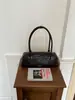 Bolso de axila de estilo francés transfronterizo de nicho para mujer, nuevo bolso baguette retro de moda, bolso de hombro y bolso de mano elegante de alta gama
