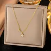 [Collar Explosiones 6] Cadena para clavícula transfronteriza de Europa y Estados Unidos collar con colgante de cruz collar de múltiples capas apiladas retro para mujer