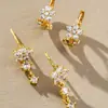 Aretes de Flor de Circonita de Oro de 18 Quilates, Diseño Simple de Flor de Cinco Pétalos, Clips para Oreja y Aretes de Lujo Ligero, Juego de Dos Piezas, Joyería para Oreja Transfronteriza Europea y Americana