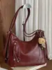 Mochila casual de gran capacidad para mujer 2026 nueva mochila para el trabajo bolsa de hombro cruzada de color liso elegante