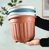 Maceta de aspecto cerámico estilo retro, diámetro extragrande, diseño nórdico, material de resina engrosada, adecuada para rosas, flores frescas y plantas verdes, con características transpirables y de control de raíces