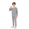 Conjunto de Pijama Redondo para Niños Dos Piezas Estilo Otoño/Invierno Unisex Suave Pegajoso Agradable a la Piel Color Sólido Versátil Cálido Conjunto para Estar en Casa