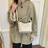 Bolsa Saco Nicho Coreana Feminina 2026 Nova Moda para o Trabalho Tendência Bolsa de Ombro Único Transversal Temperamento Casual