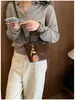 Bolso de hombro versátil, bolso de mano de alta gama de moda, bolso cubo de gamuza de nicho para el día a día, bolso cruzado de otoño e invierno