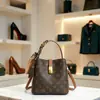 Bolso Texturizado Transfronterizo para Axila para Mujer 2026 Nueva Moda Versátil Bolso de Hombro Cruzado Bolso Cubo Estampado Retro