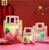 Bolso de mano transparente de PVC láser para maquillaje, bolso de compras de colores mágicos, bolso de regalo de Navidad en stock