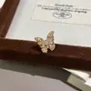 Pendientes Populares de Mariposa Cool con Tachuelas de Diamante de Xiaohongshu, Lujo Accesible Único, Pendientes de Mariposa Mini Exquisitos y de Alta Gama
