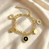 Pulsera de doble cadena de acero de titanio de moda transfronteriza europea y americana para mujer, simple y versátil, estilo ins, a la moda, lujo ligero, pulsera personalizada