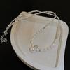 Collar de plata rota con perla estilo francés para mujer, ligero, lujoso, de alta gama, elegante, estilo frío, cadena de clavícula distintiva que combina con todo.