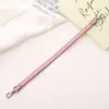 Nueva Cadena de Mano de Cuerda de Cuero Pu Muñequera Antiperdida Colgante para Teléfono Móvil Ins Versátil Decorativo para Bolso Doble Hebilla Colgante para Mujeres