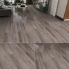 Piso Lvt Ventas de Exportación Piso para Interiores Piso de Piedra Plástico Piso Autoadhesivo Actualización de Piso Resistente al Desgaste Retardante de Llama Pegatina de Piso de PVC