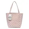 Bolso tote de lunares con un solo hombro de diseño único para mujer, nuevo modelo de verano 2026, gran capacidad, bolso con cremallera para el trabajo