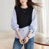 Blusa feminina patchwork falsa de duas peças, novo estilo outono 2026, camisa listrada com design irregular, corte solto, manga longa, adequada para o trabalho